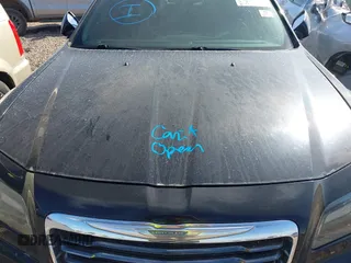 2012 Chrysler 300 S with VIN 2C3CCABGXCH313095, listed as a IAAI auction lot 41789401 with 186,302 mi miles and . Bid and sale history available at carsss.com. Image 10.