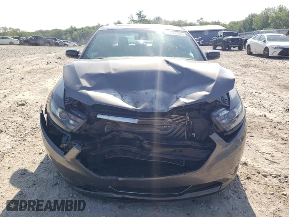 2013 Ford Taurus SHO with VIN 1FAHP2KT9DG139953, listed as a Copart auction lot 60977295 with 196,162 mi miles and Clean title. Bid and sale history available at DreamBid. Image 5.