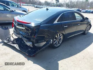 2013 Cadillac XTS Luxury with VIN 2G61P5S3XD9220510, listed as a IAAI auction lot 41977046 with 236,009 mi miles and . Bid and sale history available at DreamBid. Image 4.