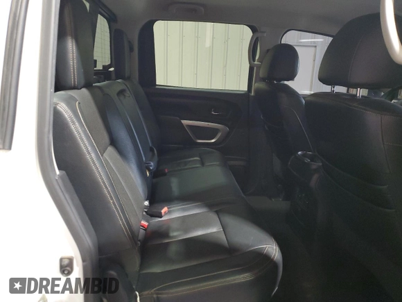 2016 Nissan Titan Platinum Reserve z VIN 1N6BA1F27GN502647, wystawiony jako Copart lot #53079895 z przebiegiem 143 384 mil mil oraz Czysty tytuł • Clean title. Historia ofert i sprzedaży dostępna na DreamBid. Obrazek 10.