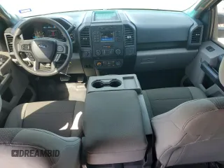 2015 Ford F-150 XLT w/HD Payload Pkg with VIN 1FTFW1EG6FFA02457, listed as a Copart auction lot 52121515 with 242,747 mi miles and Salvage Title. Bid and sale history available at carsss.com. Image 8.