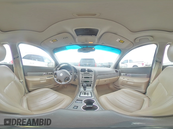 2005 Lincoln LS Sport z VIN 1LNHM87A05Y667868, wystawiony jako Copart lot #73318074 z przebiegiem 114 623 mil mil oraz Szkoda całkowita • Salvage title. Historia ofert i sprzedaży dostępna na DreamBid. Obrazek 13.