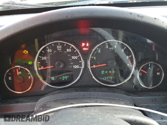 2012 Jeep Liberty Sport with VIN 1C4PJMAK1CW182621, listed as a Copart auction lot 52575175 with 134,727 mi miles and Salvage Title. Bid and sale history available at carsss.com. Image 9.