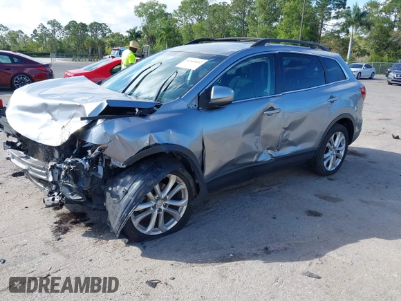 2015 Mazda CX-9 Sport with VIN JM3TB2BA1F0467162, listed as a IAAI auction lot 41565602 with 127,957 mi miles and . Bid and sale history available at carsss.com. Image 17.