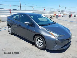 2017 Toyota Prius Two z VIN JTDKARFU4H3039947, wystawiony jako IAAI lot #42238053 z przebiegiem 134 723 mil mil oraz . Historia ofert i sprzedaży dostępna na DreamBid. Obrazek 1.