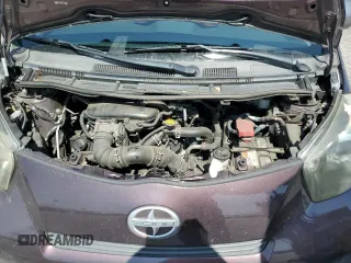 2013 Scion iQ with VIN JTNJJXB05DJ022305, listed as a Copart auction lot 58787155 with 136,046 mi miles and Salvage title. Bid and sale history available at DreamBid. Image 11.