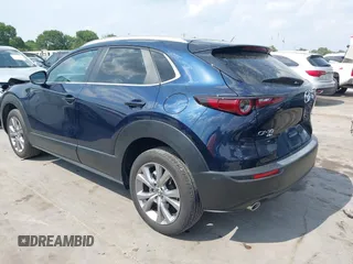 2023 Mazda CX-30 S Carbon Edition with VIN 3MVDMBCM4PM542160, listed as a IAAI auction lot 42175395 with 11,340 mi miles and . Bid and sale history available at DreamBid. Image 3.