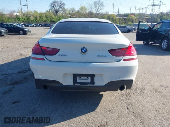2016 BMW 6 Series 640i xDrive with VIN WBA6D2C51GGT66209, listed as a IAAI auction lot 42064405 with 113,500 mi miles and . Bid and sale history available at carsss.com. Image 17.