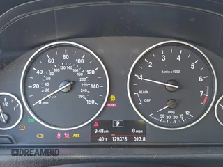 2015 BMW 3 Series 328i with VIN WBA3A5C57FF609054, listed as a IAAI auction lot 41330498 with 129,378 mi miles. Bid and sale history available at carsss.com. Image 7.