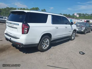 2023 Chevrolet Suburban Premier with VIN 1GNSCFKDXPR371053, listed as a IAAI auction lot 42045193 with 92,544 mi miles. Bid and sale history available at carsss.com. Image 4.