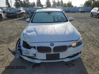 2012 BMW 3 Series 328i z VIN WBA3A5C51CF259481, wystawiony jako Copart lot #52381425 z przebiegiem 206 764 mil mil oraz Szkoda całkowita • Salvage title. Historia ofert i sprzedaży dostępna na DreamBid. Obrazek 5.