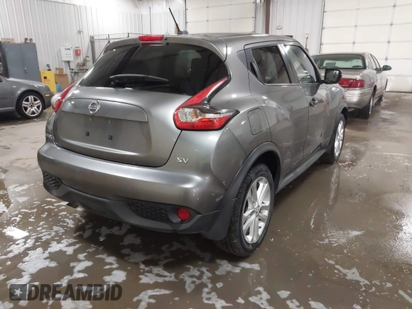 2015 Nissan Juke S with VIN JN8AF5MR6FT506551, listed as a IAAI auction lot 41387700 with 110,041 mi miles and . Bid and sale history available at DreamBid. Image 4.