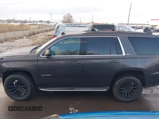 2015 GMC Yukon SLT with VIN 1GKS2BKC7FR110106, listed as a IAAI auction lot 41702260 with 108,679 mi miles. Bid and sale history available at carsss.com. Image 14.