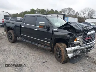 2018 GMC Sierra 2500HD SLT with VIN 1GT12TEY9JF279932, listed as a IAAI auction lot 41583208 with 70,465 mi miles. Bid and sale history available at carsss.com. Image 1.