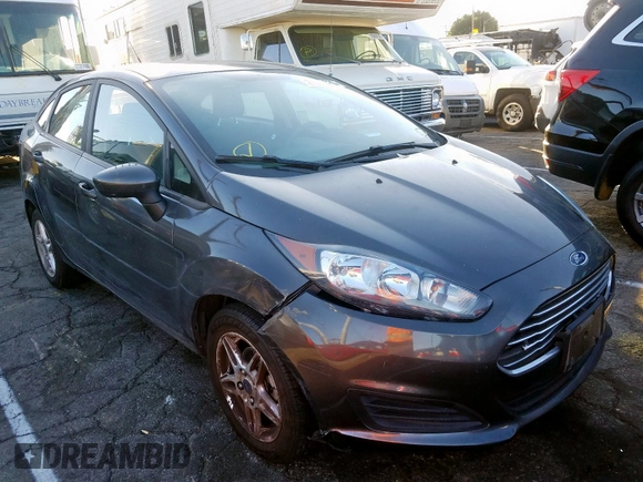 2017 Ford Fiesta SE with VIN 3FADP4BJXHM143529, listed as a Copart auction lot 27313020 with 67,577 mi miles and Salvage Title. Bid and sale history available at carsss.com. Image 1.