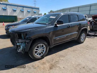 2018 Jeep Grand Cherokee Altitude with VIN 1C4RJFAG2JC148282, listed as a Copart auction lot 57315295 with 98,453 mi miles and Salvage title. Bid and sale history available at DreamBid. Image 1.