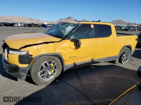2022 Rivian R1T Launch Edition z VIN 7FCTGAAL2NN011755, wystawiony jako Copart lot #81940684 z przebiegiem Nie podano mil oraz Szkoda całkowita • Salvage title. Historia ofert i sprzedaży dostępna na DreamBid. Obrazek 1.