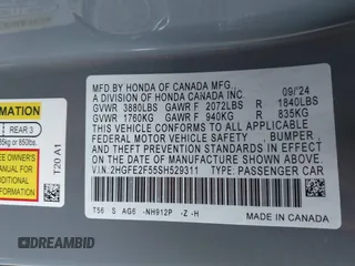 2025 Honda Civic Sport with VIN 2HGFE2F55SH529311, listed as a IAAI auction lot 41898987 with 2,873 mi miles and . Bid and sale history available at DreamBid. Image 9.