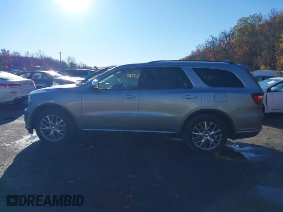 2014 Dodge Durango Citadel z VIN 1C4SDJET4EC331577, wystawiony jako IAAI lot #40923796 z przebiegiem 83 154 mil mil oraz . Historia ofert i sprzedaży dostępna na DreamBid. Obrazek 14.
