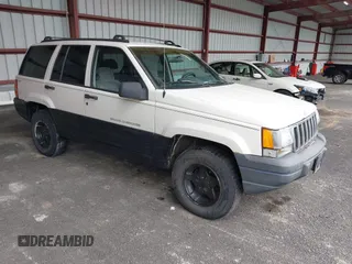 1997 Jeep Grand Cherokee Laredo with VIN 1J4GZ58S7VC737980, listed as a IAAI auction lot 42256142 with 188,958 mi miles and . Bid and sale history available at DreamBid. Image 1.