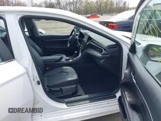2023 Toyota Camry SE with VIN 4T1G11AK7PU771765, listed as a IAAI auction lot 42060929 with 39,407 mi miles and . Bid and sale history available at DreamBid. Image 5.