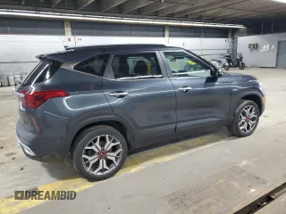 2021 Kia Seltos SX with VIN KNDETCA2XM7167199, listed as a Copart auction lot 52080495 with 82,981 mi miles and Salvage Title. Bid and sale history available at carsss.com. Image 3.