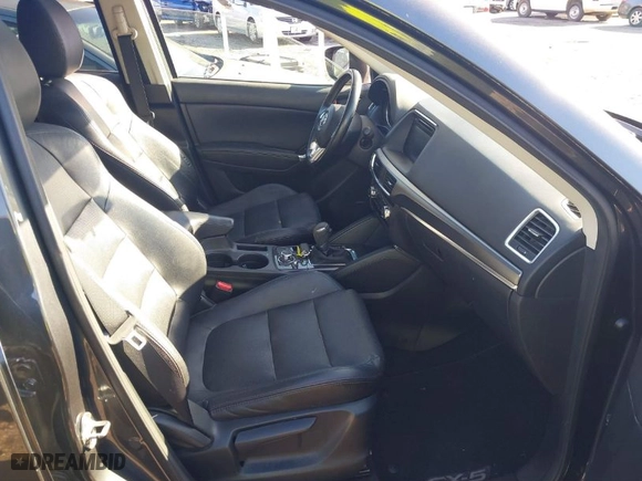 2016 Mazda CX-5 Grand Touring with VIN JM3KE4DY5G0843355, listed as a IAAI auction lot 41775499 with NaN miles. Bid and sale history available at carsss.com. Image 5.