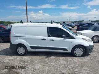 2015 Ford Transit Connect XL z VIN NM0LE7E78F1220418, wystawiony jako IAAI lot #42818192 z przebiegiem Nie podano mil oraz . Historia ofert i sprzedaży dostępna na DreamBid. Obrazek 13.