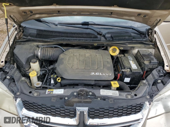 2015 Dodge Grand Caravan SXT with VIN 2C4RDGCG7FR536049, listed as a Copart auction lot 55963115 with 141,228 mi miles and Clean Title. Bid and sale history available at DreamBid. Image 12.
