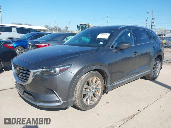 2019 Mazda CX-9 Grand Touring with VIN JM3TCADY8K0335429, listed as a IAAI auction lot 41203657 with 94,333 mi miles. Bid and sale history available at carsss.com. Image 2.