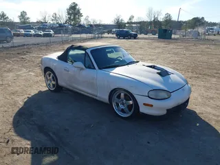 1999 Mazda MX-5 Miata z VIN JM1NB3534X0115909, wystawiony jako IAAI lot #41687832 z przebiegiem 224 347 mil mil oraz . Historia ofert i sprzedaży dostępna na DreamBid. Obrazek 1.