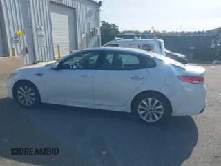 2016 Kia Optima EX with VIN 5XXGU4L32GG070138, listed as a IAAI auction lot 42138810 with 131,040 mi miles. Bid and sale history available at carsss.com. Image 14.