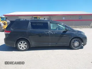 2011 Toyota Sienna XLE with VIN 5TDDK3DC8BS011975, listed as a IAAI auction lot 42112522 with 124,251 mi miles. Bid and sale history available at carsss.com. Image 13.