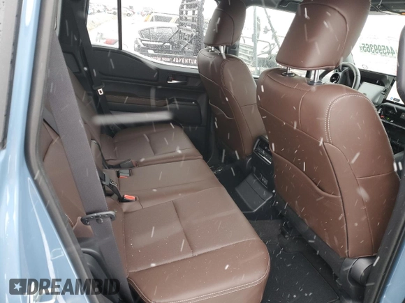 2025 Toyota Land Cruiser 1958 Edition z VIN JTEABFAJ3SK028208, wystawiony jako Copart lot #44599365 z przebiegiem 1 873 mil mil oraz Szkoda całkowita • Salvage title. Historia ofert i sprzedaży dostępna na DreamBid. Obrazek 12.