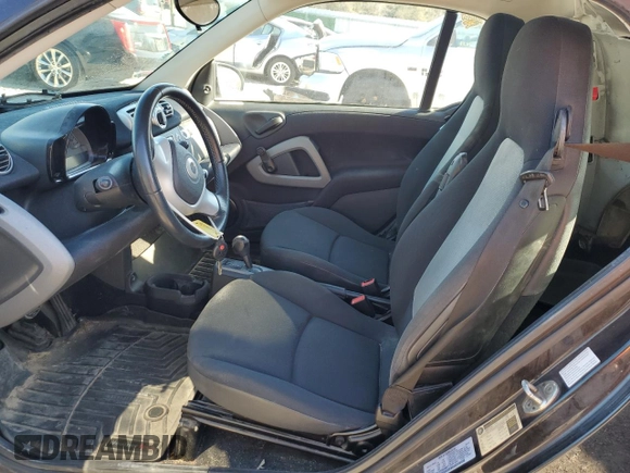 2012 Smart fortwo Pure z VIN WMEEJ3BA1CK559092, wystawiony jako Copart lot #85506924 z przebiegiem 47 806 mil mil oraz Szkoda całkowita • Salvage title. Historia ofert i sprzedaży dostępna na DreamBid. Obrazek 7.