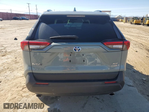 2022 Toyota RAV4 Hybrid XLE Premium with VIN 4T3B6RFV8NU102695, listed as a Copart auction lot 49876815 with 35,614 mi miles and Salvage title. Bid and sale history available at DreamBid. Image 6.