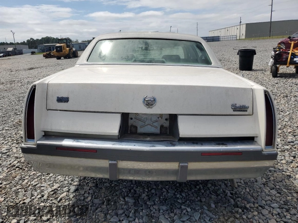 1996 Cadillac Fleetwood z VIN 1G6DW52P1TR715038, wystawiony jako Copart lot #69987194 z przebiegiem Nie podano mil oraz Szkody całkowita. Historia ofert i sprzedaży dostępna na DreamBid. Obrazek 6.
