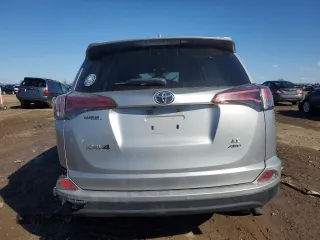 2018 Toyota RAV4 LE with VIN 2T3BFREV2JW730084, listed as a Copart auction lot 50386335 with 56,650 mi miles and Salvage Title. Bid and sale history available at carsss.com. Image 6.
