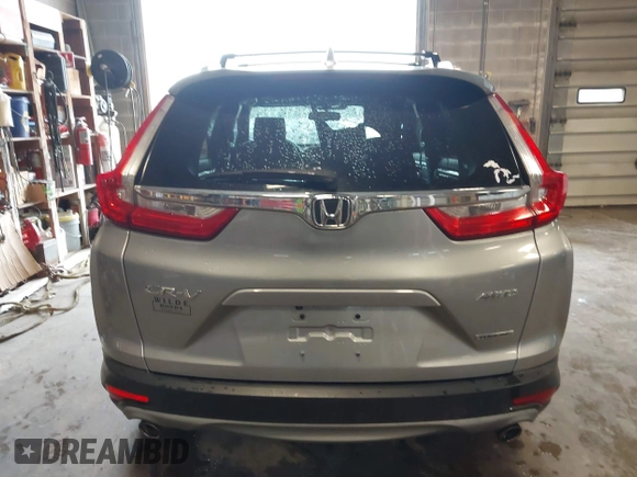 2017 Honda CR-V Touring with VIN 5J6RW2H95HL042012, listed as a IAAI auction lot 41911028 with 93,575 mi miles. Bid and sale history available at carsss.com. Image 17.