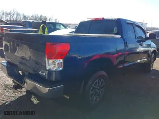 2013 Toyota Tundra 4WD Truck with VIN 5TFUM5F14DX043076, listed as a IAAI auction lot 41633905 with 157,850 mi miles. Bid and sale history available at carsss.com. Image 4.