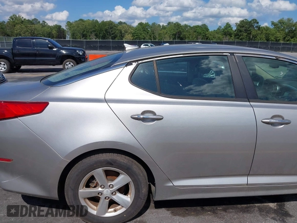 2015 Kia Optima LX with VIN 5XXGM4A79FG477619, listed as a IAAI auction lot 42561432 with 125,274 mi miles and . Bid and sale history available at DreamBid. Image 13.