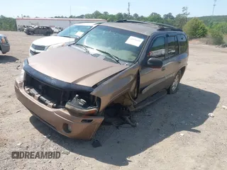 2003 GMC Envoy SLT with VIN 1GKDS13S832208655, listed as a IAAI auction lot 42076668 with 160,787 mi miles. Bid and sale history available at carsss.com. Image 2.