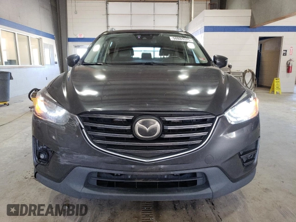 2016 Mazda CX-5 Grand Touring with VIN JM3KE4DY8G0616421, listed as a Copart auction lot 50884525 with 182,048 mi miles and Salvage Title. Bid and sale history available at DreamBid. Image 5.