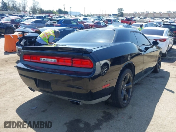 2014 Dodge Challenger R/T with VIN 2C3CDYBT8EH280622, listed as a IAAI auction lot 41973994 with 86,983 mi miles and . Bid and sale history available at DreamBid. Image 4.
