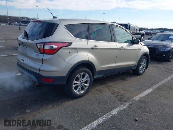 2017 Ford Escape SE with VIN 1FMCU9GD6HUD07252, listed as a IAAI auction lot 41584876 with 83,556 mi miles. Bid and sale history available at carsss.com. Image 4.