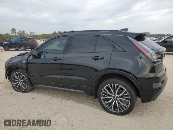 2024 Cadillac XT4 FWD Sport with VIN 1GYFZER46RF213543, listed as a Copart auction lot 83609754 with 3,878 mi miles and Salvage title. Bid and sale history available at DreamBid. Image 2.