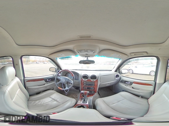 2007 GMC Envoy Denali with VIN 1GKET63M472231291, listed as a Copart auction lot 77020984 with 157,364 mi miles and Salvage Title. Bid and sale history available at DreamBid. Image 14.