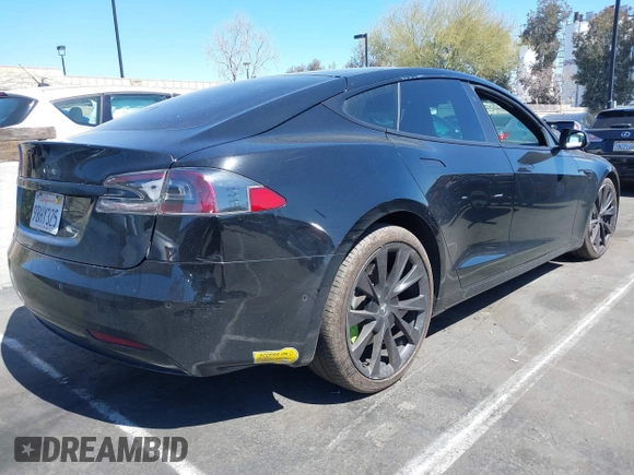 2018 Tesla Model S 75D with VIN 5YJSA1E20JF282889, listed as a IAAI auction lot 41823505 with 110,049 mi miles and . Bid and sale history available at DreamBid. Image 4.