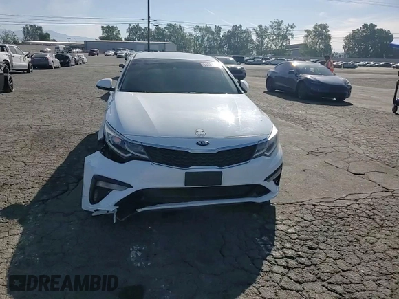 2019 Kia Optima LX z VIN 5XXGT4L33KG302810, wystawiony jako Copart lot #53821575 z przebiegiem 122 733 mil mil oraz Szkoda całkowita • Salvage title. Historia ofert i sprzedaży dostępna na DreamBid. Obrazek 13.