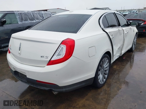 2013 Lincoln MKS with VIN 1LNHL9DK4DG605058, listed as a IAAI auction lot 41068489 with 101,801 mi miles. Bid and sale history available at carsss.com. Image 4.